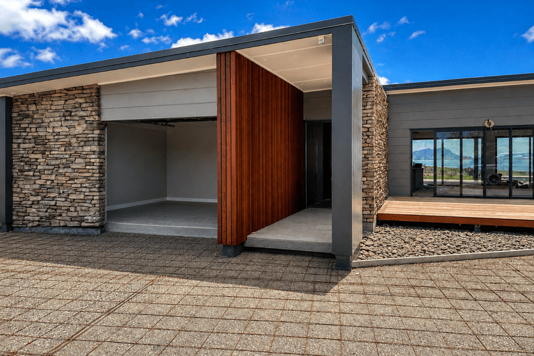 Architectural new home by Travis Wood Builder